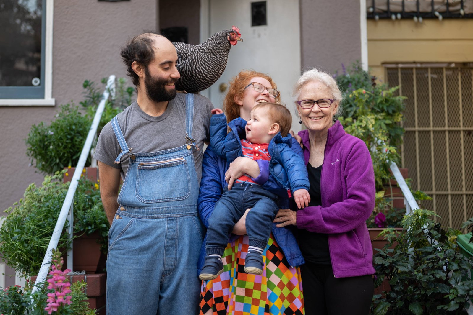 Impact Report Cover Family with Baby and Chicken